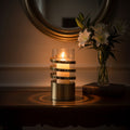 Amreli Gold Metal and Glass Large Hurricane Candle Holder with Spiral Design